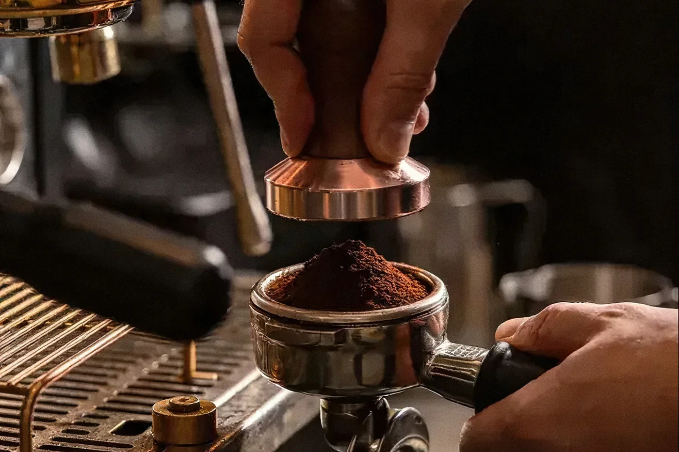Tamping the coffee